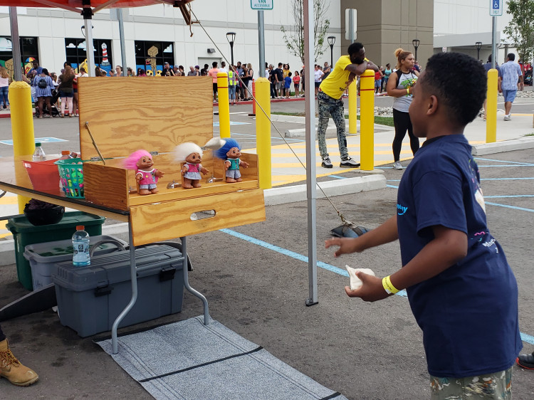 Tip a Troll bean bag toss rental — BSA Events Metro Detroit
